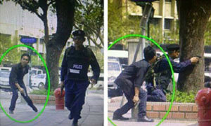 ระทึก รุมจับตำรวจนอกเครื่องแบบแอบยิงผู้ชุมนุม